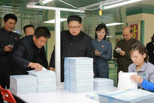 金正恩视察 蒲公英作业本工厂 称赞产品设计用心